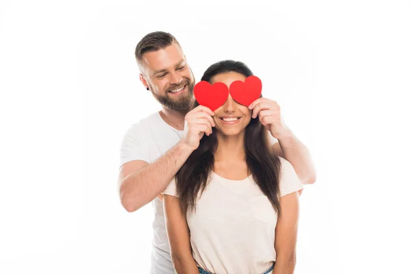 Couple with red hearts — Stock Photo