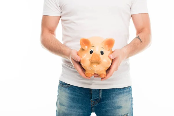 Handsome man with piggy bank — Stock Photo