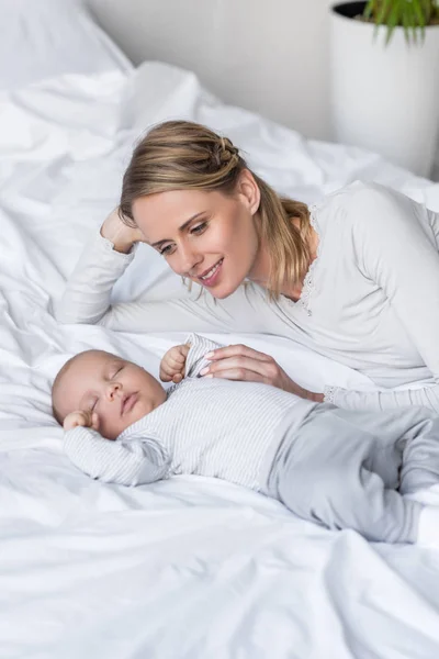 Mother with sleeping baby — Stock Photo