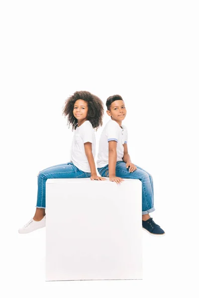 African american siblings sitting together — Stock Photo