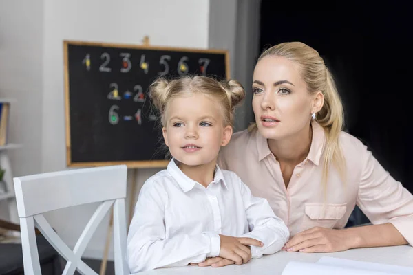 Beautiful mother and daughter — Stock Photo