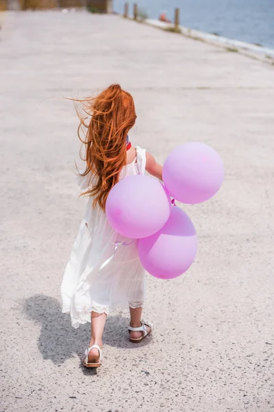 Bambino con palloncini — Foto stock