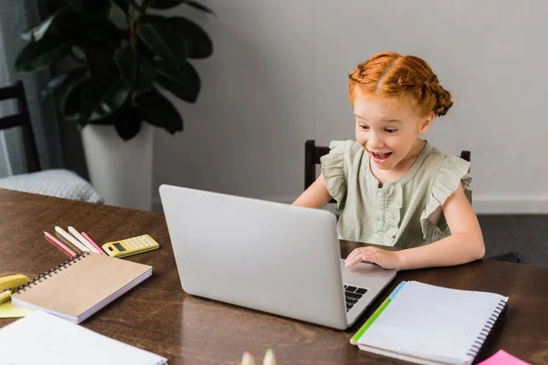 Little girl with laptop — Stock Photo