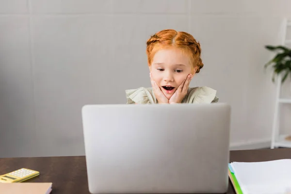 Little girl with laptop — Stock Photo