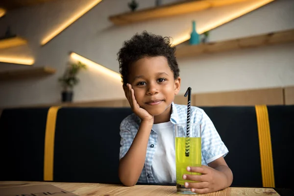 African american child drinking lemonade — Stock Photo