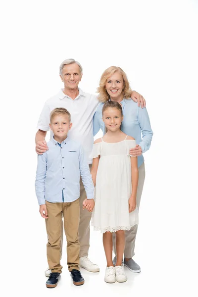 Happy grandparents and grandchildren — Stock Photo