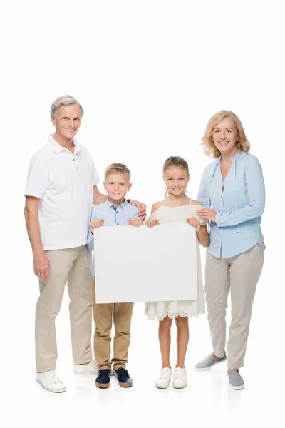 Family with empty board — Stock Photo