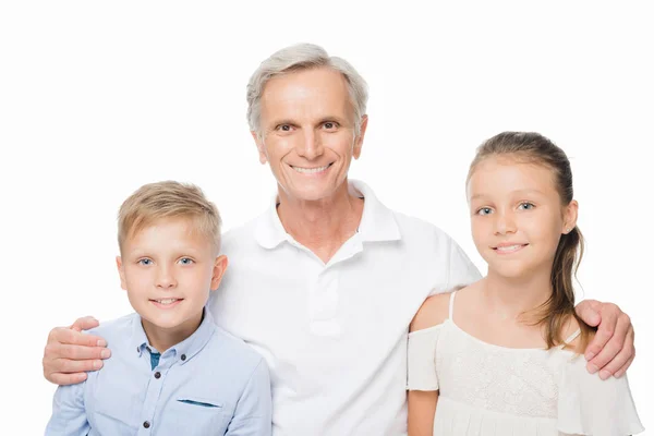 Senior man and grandchildren — Stock Photo