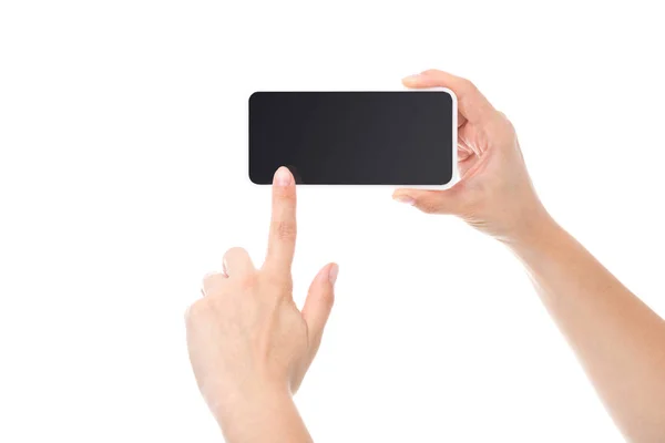 Person pointing at smartphone screen — Stock Photo