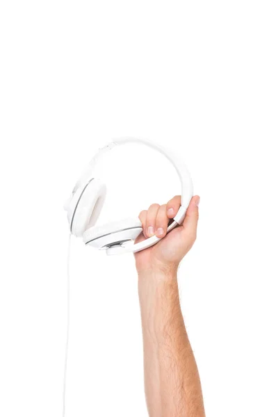 Headphones in hand — Stock Photo