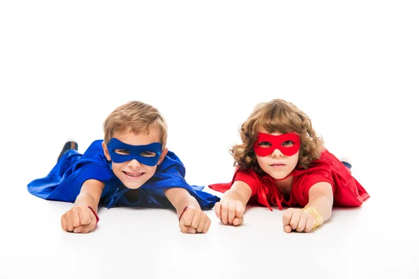Boys in superhero costumes — Stock Photo