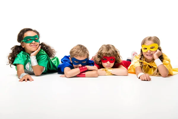 Kids in superhero costumes — Stock Photo