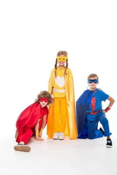 Kids in superhero costumes — Stock Photo