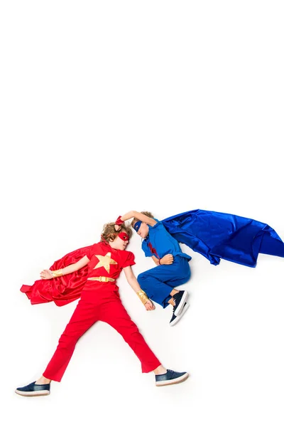 Boys in superhero costumes — Stock Photo