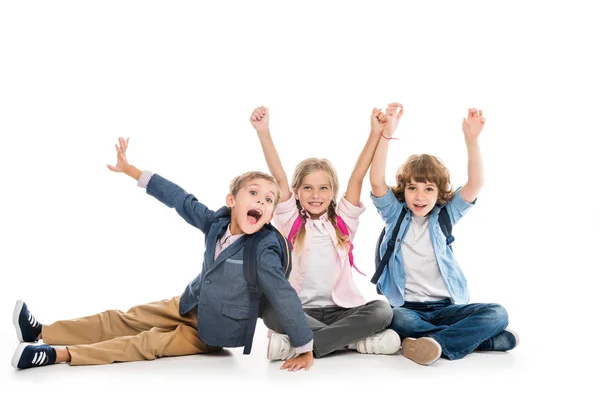 Excited classmates  with backpacks — Stock Photo