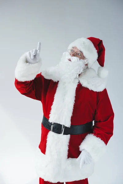 Père Noël claus pointant du doigt — Photo de stock