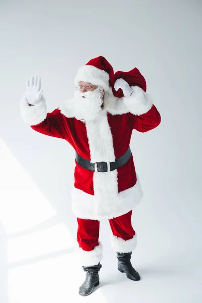 Papai Noel acenando mão — Stock Photo