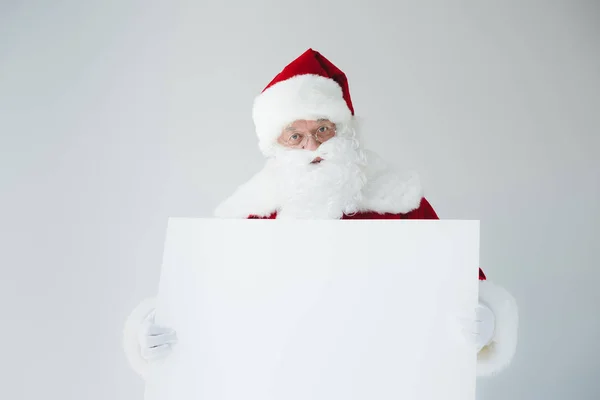 Weihnachtsmann mit leerem Banner — Stockfoto