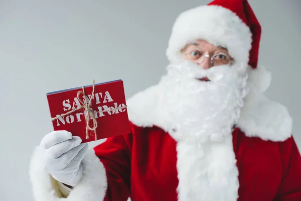 Santa claus holding letters — Stock Photo