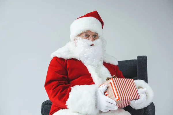 Santa claus with gift box — Stock Photo