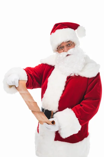 Santa claus with wish list — Stock Photo