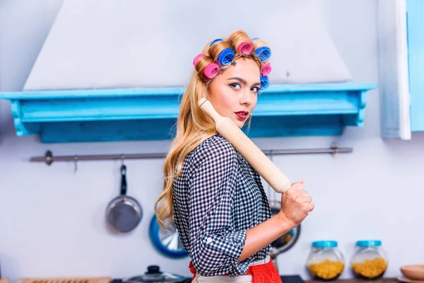 Housewife with rolling pin — Stock Photo