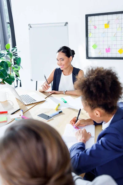 Young businesswomen working together — Stock Photo