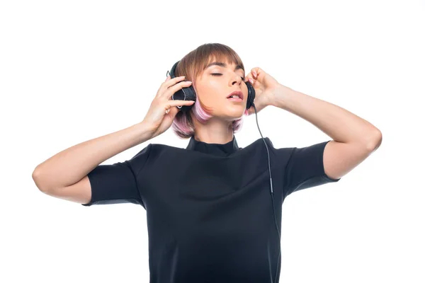 Girl listening music with headphones — Stock Photo