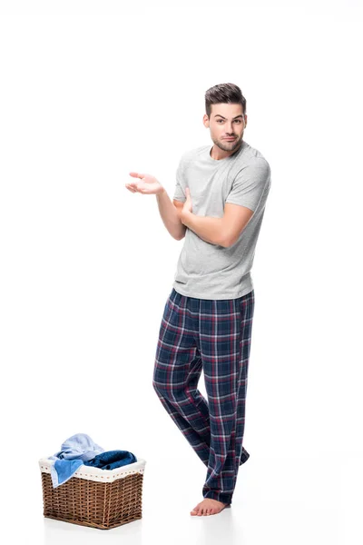 Man with basket of laundry — Stock Photo