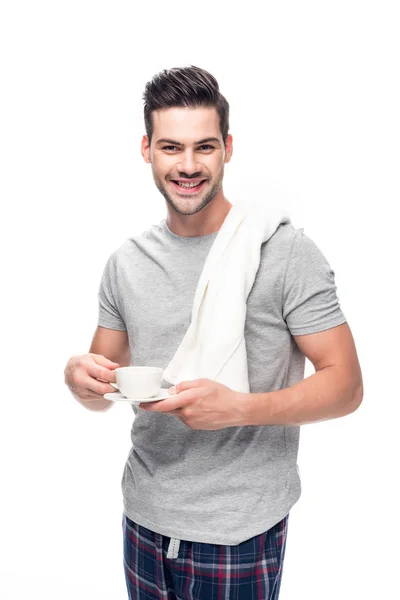 Man in pajamas with coffee — Stock Photo