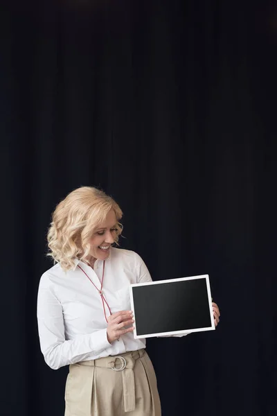 Woman with blank blackboard — Stock Photo