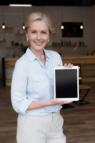 Shop owner with blackboard — Stock Photo