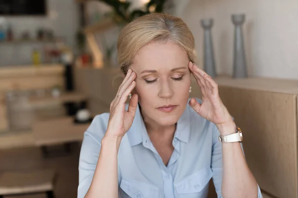 Stressed mature woman — Stock Photo