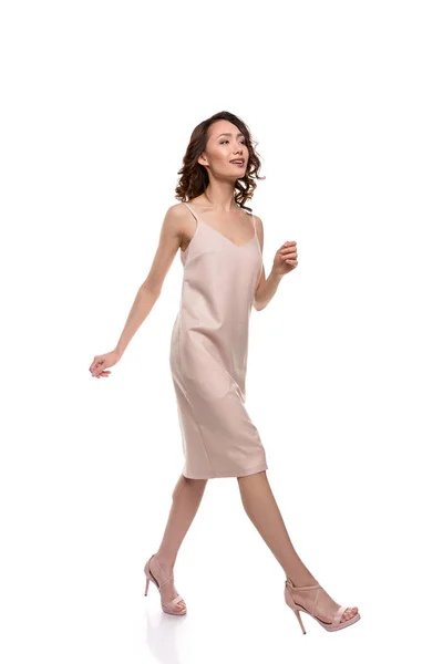 Asian girl in dress walking — Stock Photo