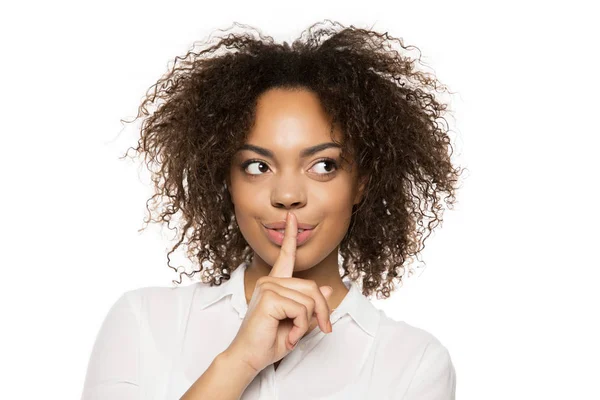 African american girl gesturing for silence — Stock Photo