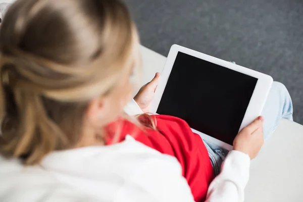 Kid using digital tablet — Stock Photo