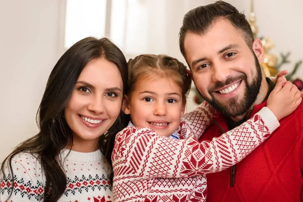 Happy parents with daughter — Stock Photo