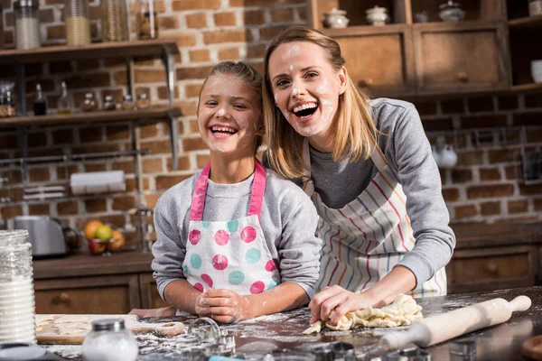 Family having fun while cooking together — Stock Photo
