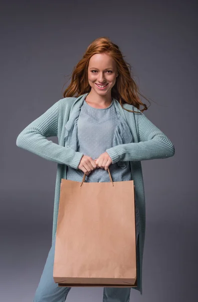 Girl holding shopping bags — Stock Photo