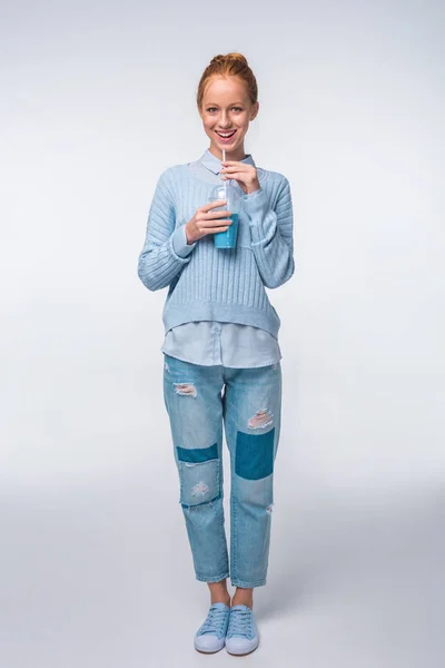 Girl with blue beverage — Stock Photo