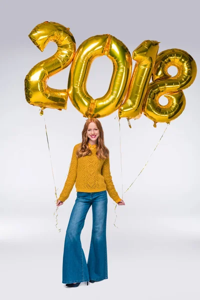 Chica con 2018 globos - foto de stock