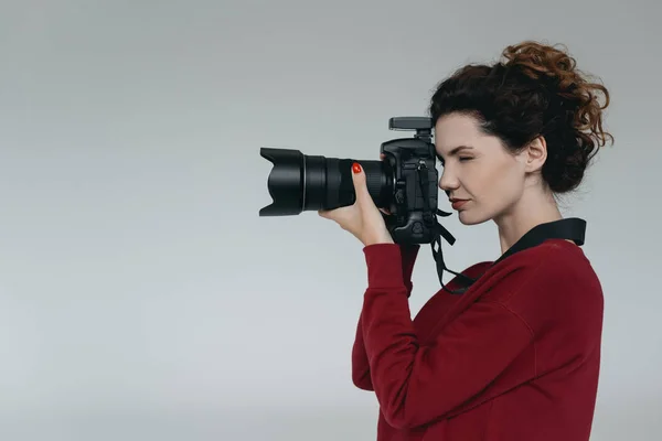 Professional photographer with camera — Stock Photo