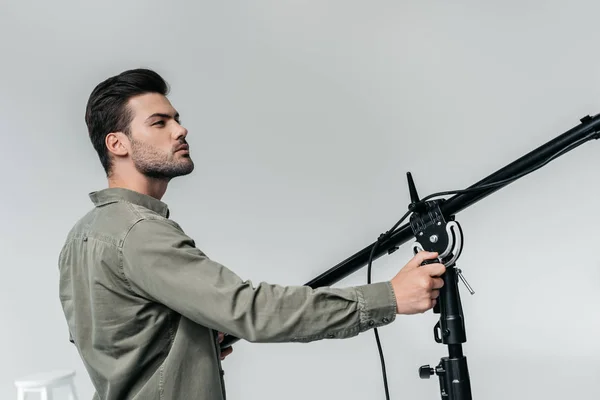 Photographer with lighting equipment — Stock Photo