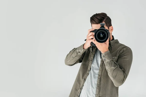 Photographer with digital photo camera — Stock Photo