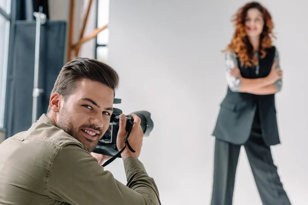 Professional photographer on fashion shoot — Stock Photo