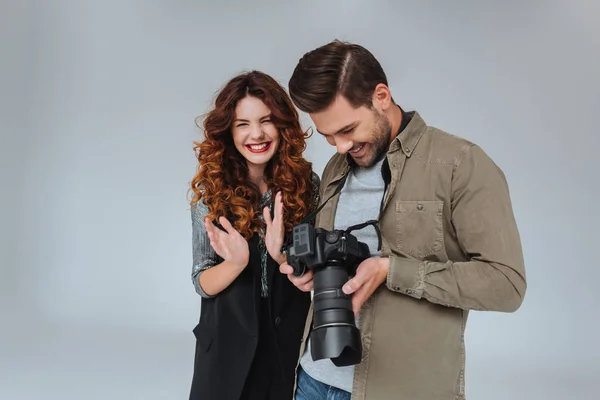 Model and photographer with photo camera — Stock Photo