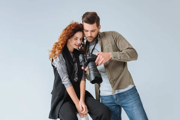 Photographer and attractive model — Stock Photo