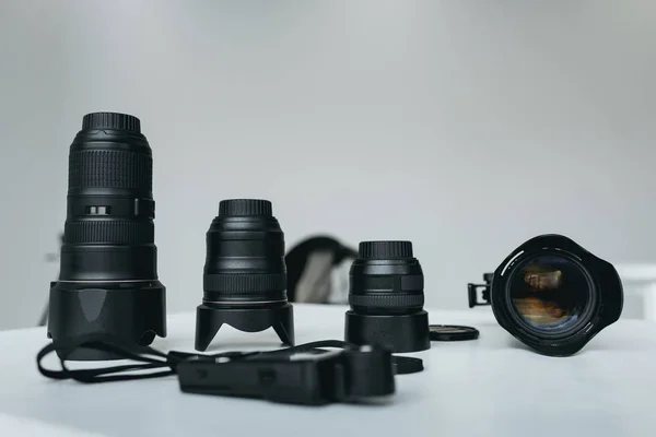 Lenses and light meter — Stock Photo