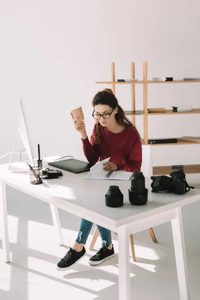 Photographer working with graphics tablet — Stock Photo