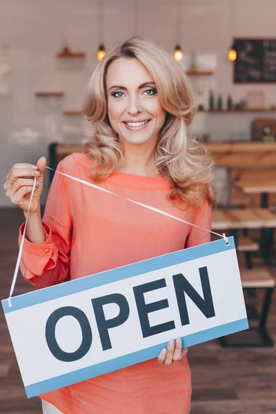 Cafe owner with sign open — Stock Photo